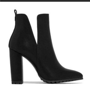 Sassy ankle boots!! Never worn!! Selling because they are unfortunately too big